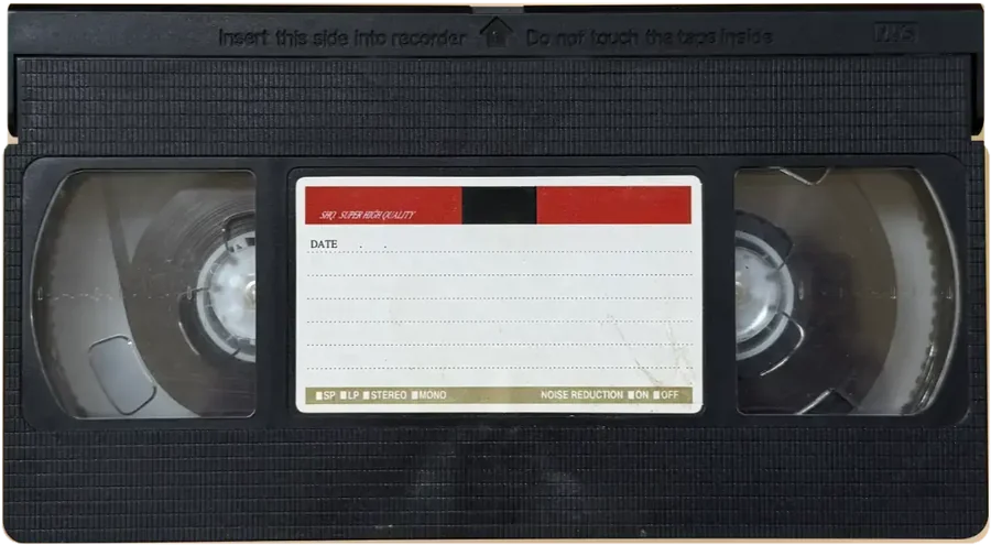 A well-worn VHS tape labeled in marker: Do not tape over!!